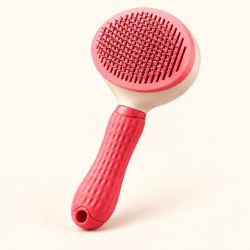 Brosse autonettoyante pour chien et chat contre les poils morts